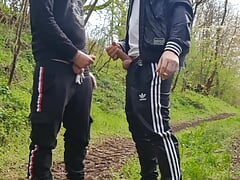 Two hot, horny boys smoking and wanking their dicks outdoors
