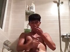 Chinese man solo handjob big cumshot in the toilet