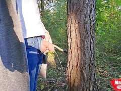 On a walk in the forest, pissing under a tree