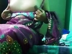 Indian Gay Crossdresser in pink saree pressing and milking his boobs so hard and enjoying the hardcore sex