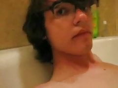 Cute hipster twink strokes and cums in the tub